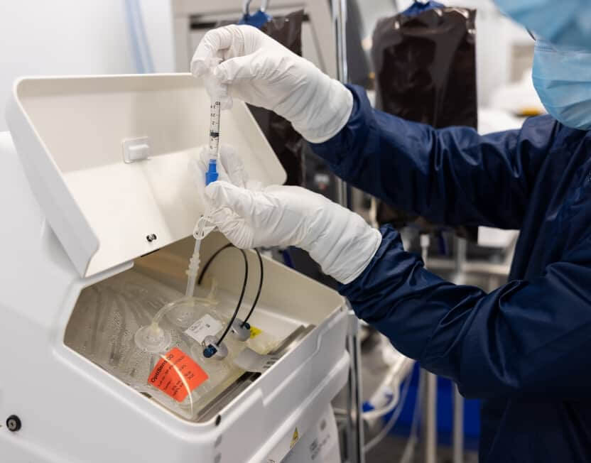 A lyell lab employee preparing a sample