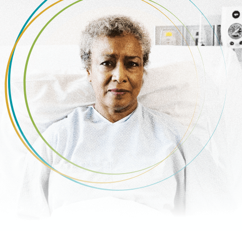 A patient living with cancer in bed